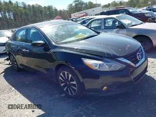 2018 Nissan Altima S with VIN 1N4AL3AP2JC187708, listed as a IAAI auction lot 41864283 with 158,527 mi miles and . Bid and sale history available at DreamBid. Image 13.