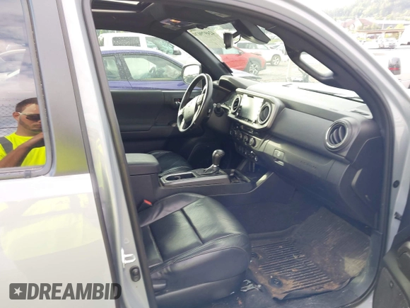 2021 Toyota Tacoma SR with VIN 5TFCZ5AN7MX255512, listed as a IAAI auction lot 42497907 with 50,563 mi miles and . Bid and sale history available at DreamBid. Image 5.