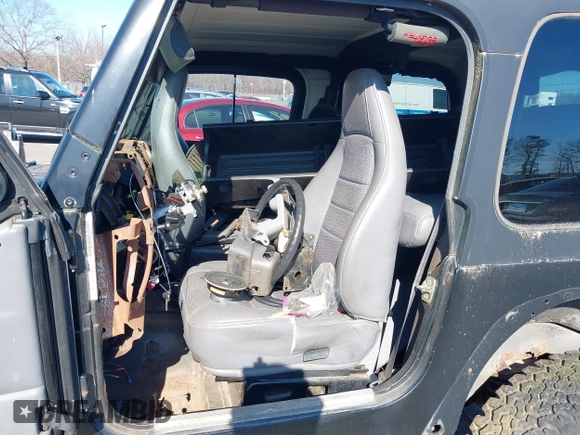 1997 Jeep Wrangler SE with VIN 1J4FY29P6VP438125, listed as a IAAI auction lot 41770455 with 163,001 mi miles. Bid and sale history available at carsss.com. Image 5.