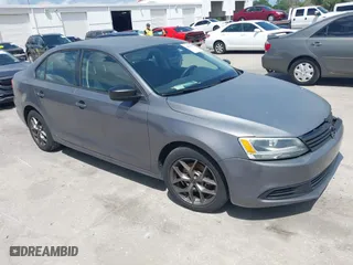 2012 Volkswagen Jetta Sedan S with VIN 3VW2K7AJ4CM402220, listed as a IAAI auction lot 42002087 with 123,820 mi miles. Bid and sale history available at carsss.com. Image 1.