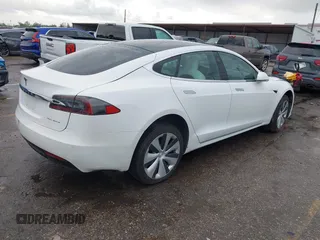 2021 Tesla Model S Long Range Plus with VIN 5YJSA1E21MF425482, listed as a IAAI auction lot 41886030 with Not provided miles and . Bid and sale history available at DreamBid. Image 4.