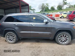 2014 Jeep Grand Cherokee Limited z VIN 1C4RJFBG5EC431229, wystawiony jako IAAI lot #42436481 z przebiegiem 102 442 mil mil oraz . Historia ofert i sprzedaży dostępna na DreamBid. Obrazek 13.