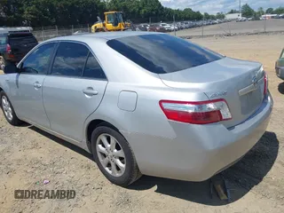 2007 Toyota Camry z VIN 4T1BB46K37U007610, wystawiony jako IAAI lot #42546223 z przebiegiem 252 363 mil mil oraz . Historia ofert i sprzedaży dostępna na DreamBid. Obrazek 3.