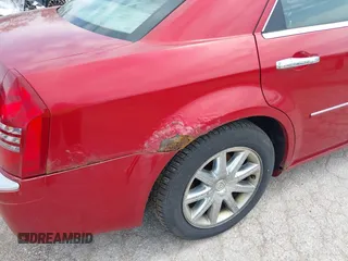 2007 Chrysler 300 C with VIN 2C3KA63H57H684368, listed as a IAAI auction lot 42144972 with 117,478 mi miles. Bid and sale history available at carsss.com. Image 6.