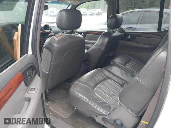 2003 GMC Envoy SLT with VIN 1GKES16S936189719, listed as a IAAI auction lot 42122292 with 289,810 mi miles and . Bid and sale history available at DreamBid. Image 8.