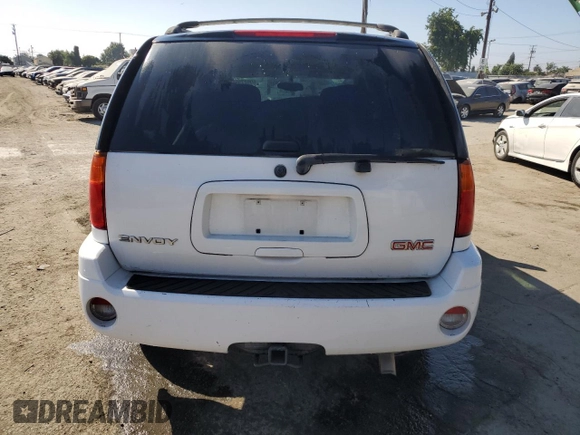 2008 GMC Envoy SLE1 with VIN 1GKDS13S182137239, listed as a Copart auction lot 69627594 with 135,160 mi miles and Salvage Title. Bid and sale history available at DreamBid. Image 6.