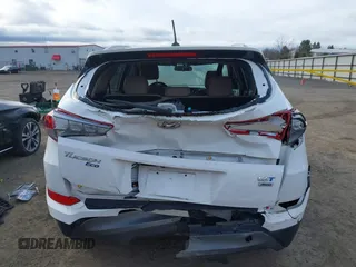 2016 Hyundai Tucson Eco with VIN KM8J3CA23GU192106, listed as a IAAI auction lot 41885799 with 151,781 mi miles. Bid and sale history available at carsss.com. Image 16.