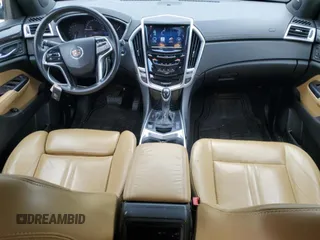 2014 Cadillac SRX Luxury Collection z VIN 3GYFNEE33ES639155, wystawiony jako Copart lot #58591935 z przebiegiem 76 368 mil mil oraz Szkoda całkowita • Salvage title. Historia ofert i sprzedaży dostępna na DreamBid. Obrazek 8.