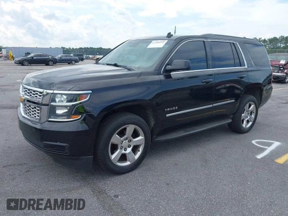2015 Chevrolet Tahoe LT with VIN 1GNSCBKC4FR145119, listed as a IAAI auction lot 42309931 with 99,408 mi miles and . Bid and sale history available at DreamBid. Image 21.