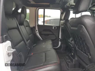2023 Jeep Wrangler Rubicon with VIN 1C4JJXFM3PW585720, listed as a Copart auction lot 59776305 with 19,190 mi miles and Salvage title. Bid and sale history available at DreamBid. Image 10.