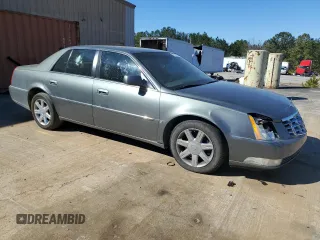 2006 Cadillac DTS 1SD z VIN 1G6KD57Y76U179888, wystawiony jako Copart lot #47218125 z przebiegiem 181 683 mil mil oraz Szkoda całkowita • Salvage title. Historia ofert i sprzedaży dostępna na DreamBid. Obrazek 4.