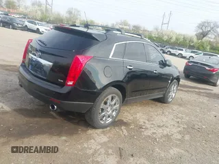 2012 Cadillac SRX Premium Collection with VIN 3GYFNFE34CS614896, listed as a IAAI auction lot 41987735 with 93,972 mi miles and . Bid and sale history available at DreamBid. Image 4.