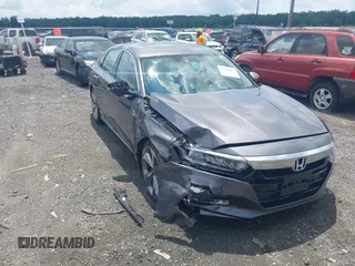 2018 Honda Accord Touring with VIN 1HGCV1F9XJA191479, listed as a IAAI auction lot 42731155 with 104,180 mi miles and . Bid and sale history available at DreamBid. Image 1.
