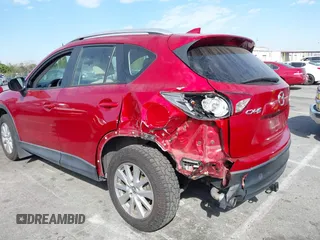 2016 Mazda CX-5 Sport with VIN JM3KE2BY4G0701442, listed as a IAAI auction lot 41682335 with 125,624 mi miles. Bid and sale history available at carsss.com. Image 3.