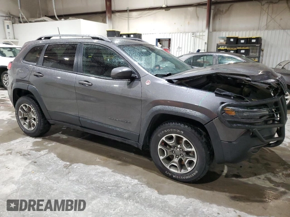 2020 Jeep Cherokee Trailhawk z VIN 1C4PJMBX5LD591873, wystawiony jako Copart lot #54308695 z przebiegiem 34 615 mil mil oraz Szkoda całkowita • Salvage title. Historia ofert i sprzedaży dostępna na DreamBid. Obrazek 4.