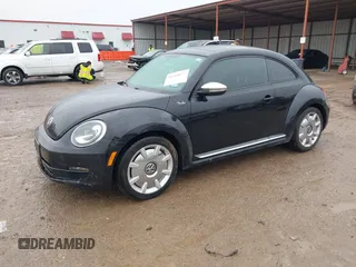2013 Volkswagen Beetle 2.5L w/Sun/Sound/Nav with VIN 3VWJX7AT1DM686146, listed as a IAAI auction lot 41444277 with 92,964 mi miles and . Bid and sale history available at DreamBid. Image 17.