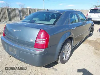2005 Chrysler 300 with VIN 2C3AA63H45H502345, listed as a IAAI auction lot 41877543 with 96,541 mi miles. Bid and sale history available at carsss.com. Image 4.