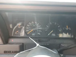1989 Dodge Spirit z VIN 1B3BA46K1KF408949, wystawiony jako Copart lot #80767594 z przebiegiem 137 766 mil mil oraz Nie do naprawy. Historia ofert i sprzedaży dostępna na DreamBid. Obrazek 9.