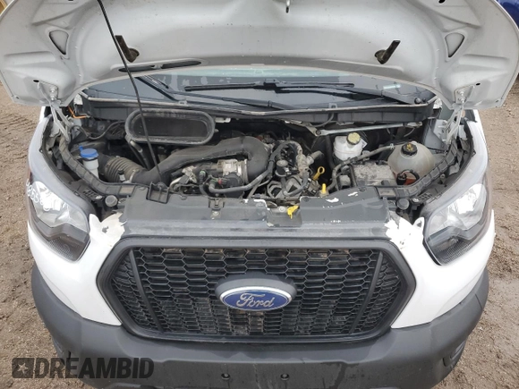 2021 Ford Transit Cargo with VIN 1FTBR1X8XMKA57008, listed as a Copart auction lot 57188105 with 61,993 mi miles and Clean title. Bid and sale history available at DreamBid. Image 12.