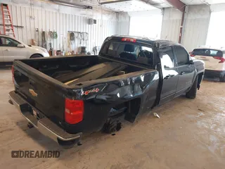2017 Chevrolet Silverado 1500 LT with VIN 1GCVKREC8HZ110471, listed as a IAAI auction lot 41989681 with 148,353 mi miles and . Bid and sale history available at DreamBid. Image 4.