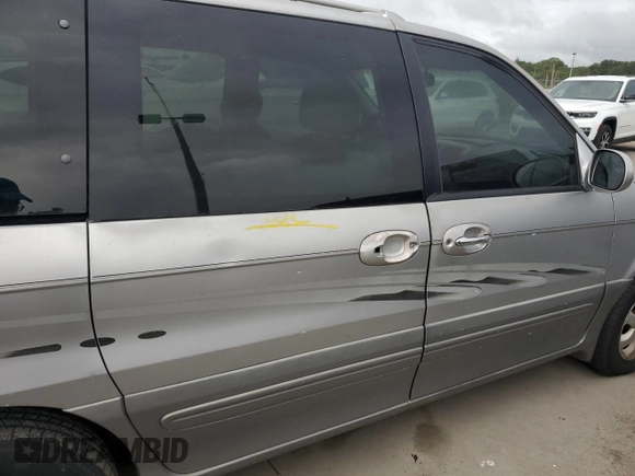 2004 Kia Sedona LX with VIN KNDUP131446570061, listed as a Copart auction lot 74222344 with 0 mi miles and Salvage Title. Bid and sale history available at carsss.com. Image 13.