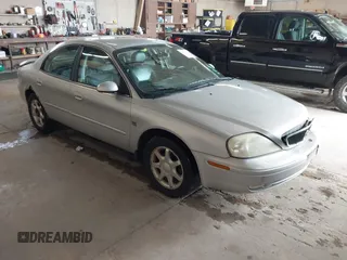 2003 Mercury Sable LS Premium with VIN 1MEFM55S63G621064, listed as a IAAI auction lot 42099656 with 182,862 mi miles. Bid and sale history available at carsss.com. Image 1.