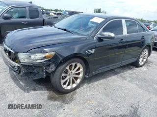 2013 Ford Taurus Limited with VIN 1FAHP2F84DG220283, listed as a IAAI auction lot 40045974 with 155,409 mi miles and . Bid and sale history available at DreamBid. Image 2.