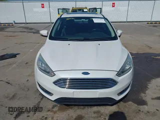 2016 Ford Focus Titanium z VIN 1FADP3J23GL358772, wystawiony jako IAAI lot #42103694 z przebiegiem 85 290 mil mil oraz . Historia ofert i sprzedaży dostępna na DreamBid. Obrazek 12.