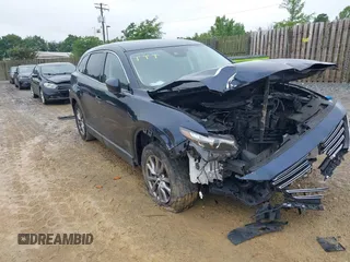 2019 Mazda CX-9 Touring z VIN JM3TCBCY6K0326848, wystawiony jako IAAI lot #42357207 z przebiegiem 114 386 mil mil oraz . Historia ofert i sprzedaży dostępna na DreamBid. Obrazek 1.