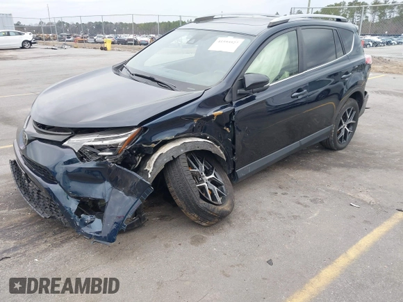 2017 Toyota RAV4 SE with VIN JTMJFREV0HD200683, listed as a IAAI auction lot 41595927 with 109,981 mi miles and . Bid and sale history available at DreamBid. Image 17.