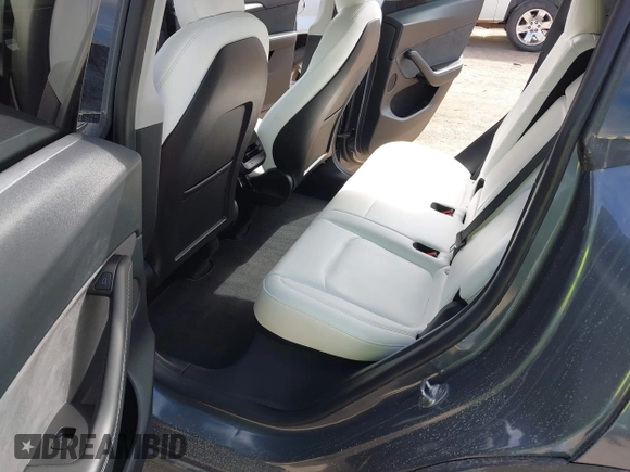 2022 Tesla Model Y Long Range with VIN 7SAYGDEE5NF534259, listed as a IAAI auction lot 41860246 with 24,513 mi miles and . Bid and sale history available at carsss.com. Image 8.