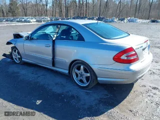 2003 Mercedes-Benz CLK-Class 5.0L with VIN WDBTJ75J03F059702, listed as a IAAI auction lot 41687017 with 185,854 mi miles. Bid and sale history available at carsss.com. Image 3.