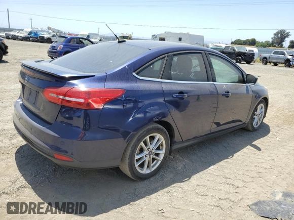 2016 Ford Focus Titanium z VIN 1FADP3J2XGL319399, wystawiony jako Copart lot #59258745 z przebiegiem 215 296 mil mil oraz Szkoda całkowita • Salvage title. Historia ofert i sprzedaży dostępna na DreamBid. Obrazek 3.