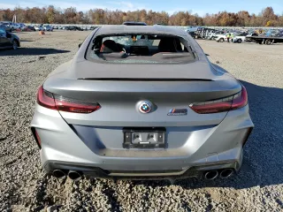 2023 BMW M8 Competition with VIN WBSAE0C09PCM48868, listed as a Copart auction lot 77753414 with 0 mi miles and Salvage Title. Bid and sale history available at carsss.com. Image 6.