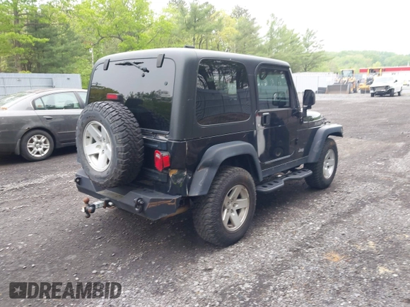 2006 Jeep Wrangler Rubicon z VIN 1J4FA69S76P749712, wystawiony jako IAAI lot #42240375 z przebiegiem 75 405 mil mil oraz . Historia ofert i sprzedaży dostępna na DreamBid. Obrazek 4.