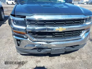 2019 Chevrolet Silverado 1500 LT with VIN 2GCVKPEC7K1201655, listed as a IAAI auction lot 42086498 with 64,938 mi miles and . Bid and sale history available at DreamBid. Image 6.