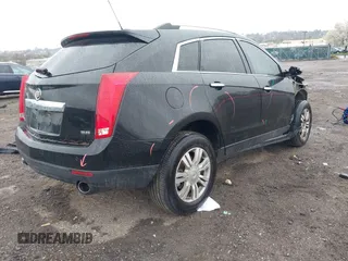 2016 Cadillac SRX Luxury Collection with VIN 3GYFNEE33GS561222, listed as a IAAI auction lot 42012531 with 82,324 mi miles. Bid and sale history available at carsss.com. Image 4.
