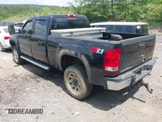 2013 GMC Sierra 2500HD SLT with VIN 1GT121E82DF120632, listed as a IAAI auction lot 42136305 with 171,967 mi miles and . Bid and sale history available at DreamBid. Image 3.