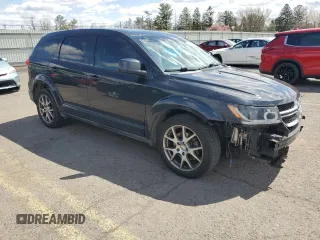 2012 Dodge Journey GT with VIN 3C4PDCEG0CT332909, listed as a Copart auction lot 52437575 with 97,973 mi miles and Salvage Title. Bid and sale history available at DreamBid. Image 4.