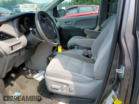 2016 Toyota Sienna LE with VIN 5TDJK3DC3GS134674, listed as a Copart auction lot 67357104 with 105,079 mi miles and Salvage Title. Bid and sale history available at carsss.com. Image 7.