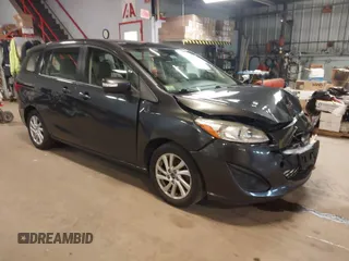 2013 Mazda 5 Sport with VIN JM1CW2BL1D0148968, listed as a IAAI auction lot 40066752 with 166,753 mi miles. Bid and sale history available at carsss.com. Image 1.