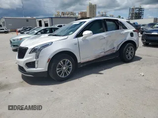 2021 Cadillac XT5 FWD Premium Luxury with VIN 1GYKNCR44MZ106982, listed as a Copart auction lot 62234455 with 93,079 mi miles and Salvage title. Bid and sale history available at DreamBid. Image 1.