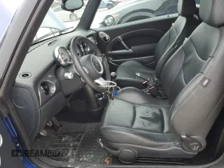 2007 MINI Convertible S with VIN WMWRH33567TJ45123, listed as a Copart auction lot 55702735 with 60,117 mi miles and Salvage title. Bid and sale history available at DreamBid. Image 7.