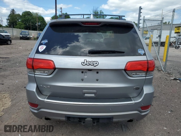 2015 Jeep Grand Cherokee Overland with VIN 1C4RJFCG3FC880084, listed as a Copart auction lot 57291165 with 112,442 mi miles and Salvage title. Bid and sale history available at DreamBid. Image 6.