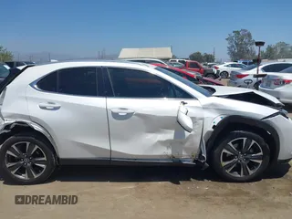 2020 Lexus UX 200 z VIN JTHX3JBH3L2029076, wystawiony jako IAAI lot #42554639 z przebiegiem 62 861 mil mil oraz . Historia ofert i sprzedaży dostępna na DreamBid. Obrazek 13.