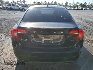 2015 Volvo S60 T5 Drive-E Premier with VIN YV140MFK4F2338462, listed as a Copart auction lot 48485665 with 57,695 mi miles and Salvage title. Bid and sale history available at DreamBid. Image 6.