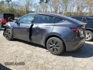 2024 Tesla Model Y Long Range z VIN 7SAYGDEE3RA323029, wystawiony jako Copart lot #50171805 z przebiegiem Nie podano mil oraz Szkoda całkowita • Salvage title. Historia ofert i sprzedaży dostępna na DreamBid. Obrazek 2.
