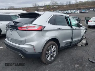 2019 Ford Edge Titanium with VIN 2FMPK4K95KBB55619, listed as a IAAI auction lot 42048941 with 89,999 mi miles. Bid and sale history available at carsss.com. Image 4.