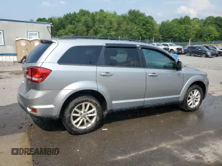 2017 Dodge Journey SXT with VIN 3C4PDDBG5HT575049, listed as a Copart auction lot 59027625 with 71,603 mi miles and Salvage title. Bid and sale history available at DreamBid. Image 3.