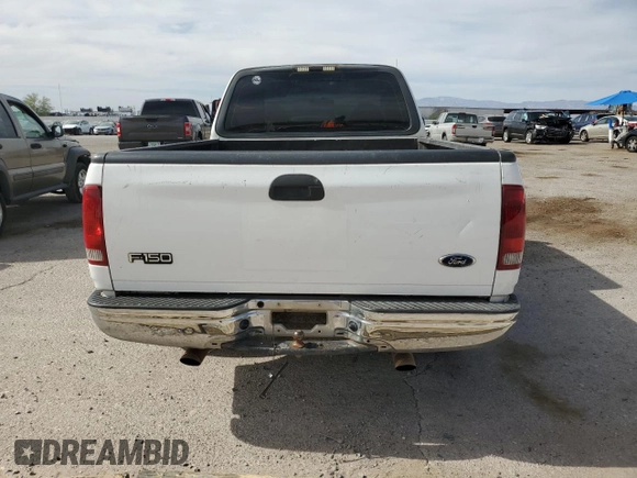 2003 Ford F-150 XL z VIN 1FTRX17233NB92067, wystawiony jako Copart lot #57986555 z przebiegiem 179 101 mil mil oraz Szkoda całkowita • Salvage title. Historia ofert i sprzedaży dostępna na DreamBid. Obrazek 6.